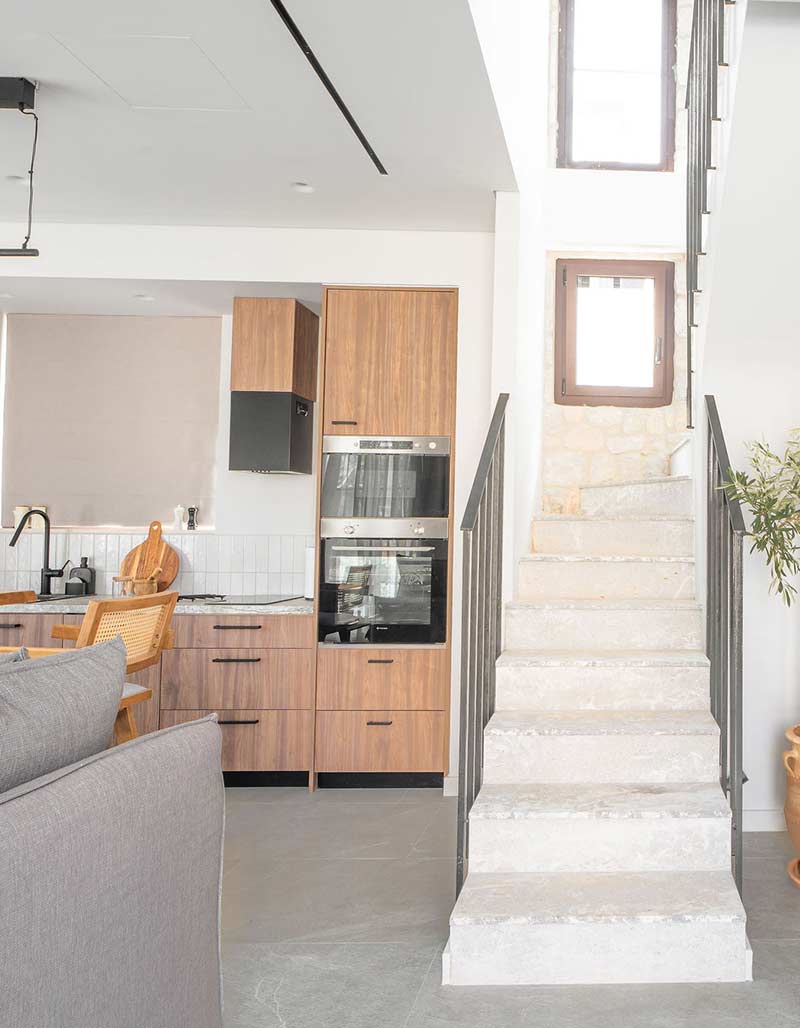 Fully equipped modern kitchen with high-end appliances and sleek design at Kepos Villas.